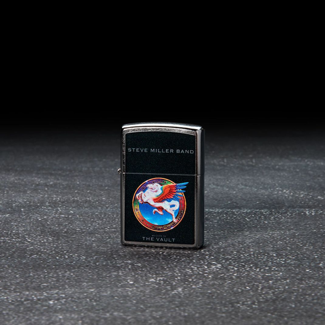 Steve Miller Band Welcome to the Vault Design Street Chrome?äó Windproof Lighter with its lid open and unlit.